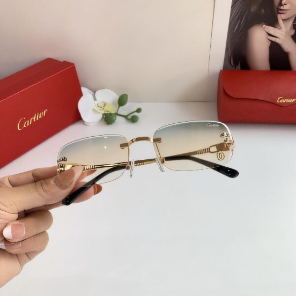 卡地亚（Cartier）无框金属链饰太阳镜  浅黄色