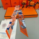 爱马仕Hermes“优雅骑士”Twilly小丝巾 橙蓝撞色