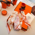 爱马仕Twilly 顶级斜纹真丝飘带 白橙撞色 - Image 4