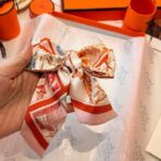 爱马仕Twilly 顶级斜纹真丝飘带 白橙撞色 - Image 3