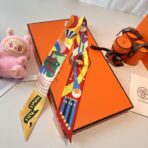 爱马仕Twilly斜纹真丝飘带 红黄撞色 - 图片 2