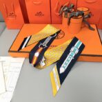 爱马仕“盛大欢庆”Twilly方巾 黑黄撞色 - 图片 3