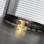 赛琳（Celine）Triomphe 系列黑色老花帆布皮革金色 Triomphe 扣腰带