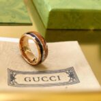 古驰（GUCCI）Icon 系列玫瑰金色金属配木质纹理宽版戒指 - Imagem 2